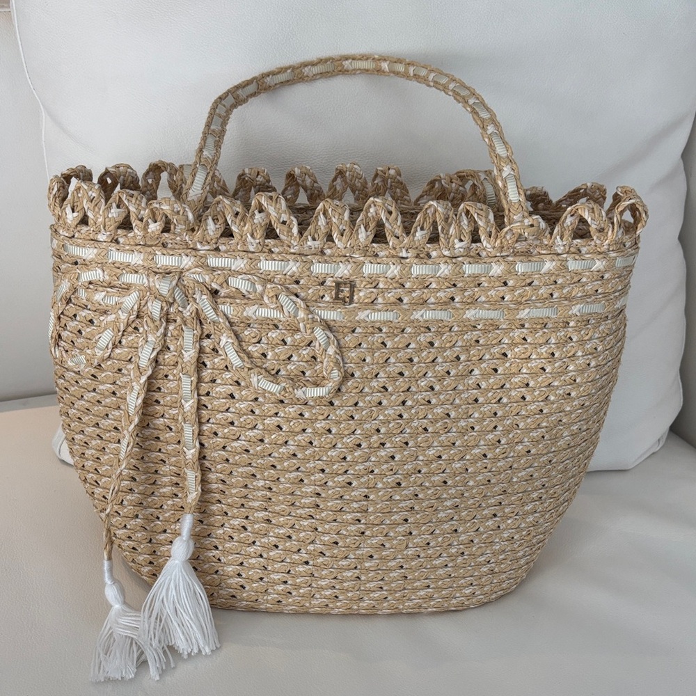 Eric Javitz elegant woven tote. Perfect for packing and the beach. Quiet luxury.